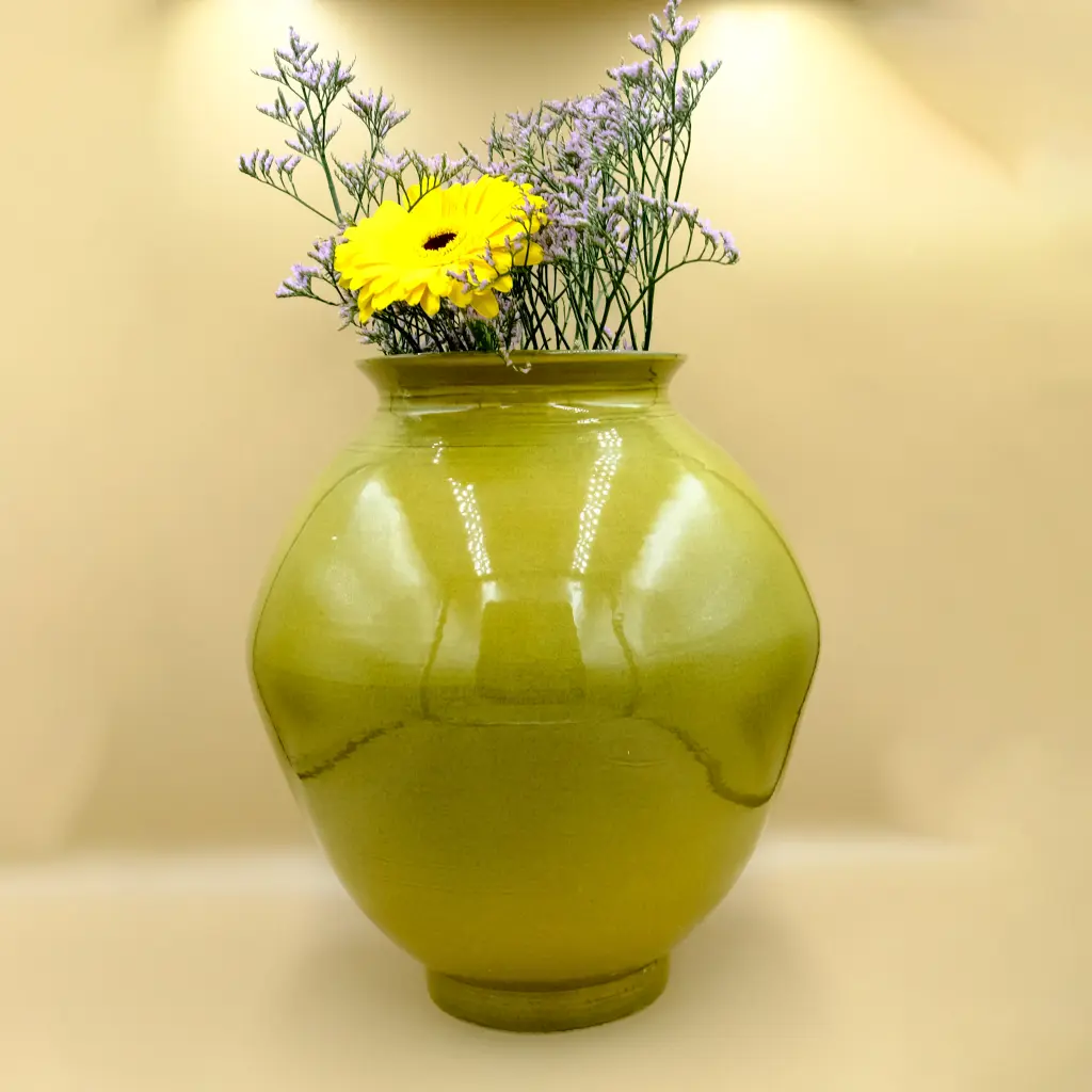 Radiance, a yellow and black glazed moon jar