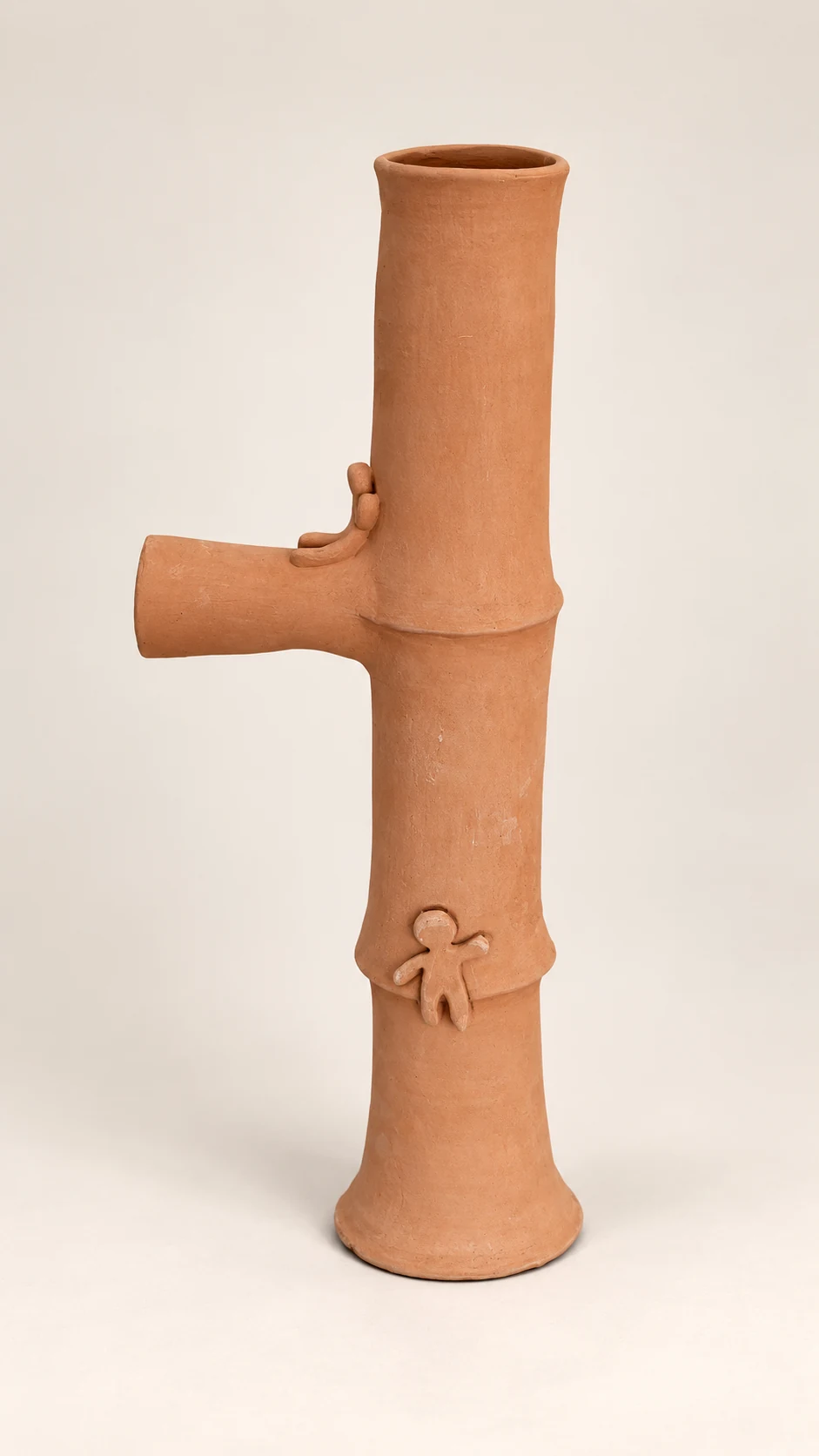 Tree of Life, a tall handbuilt terracotta vessel with climbing figures
